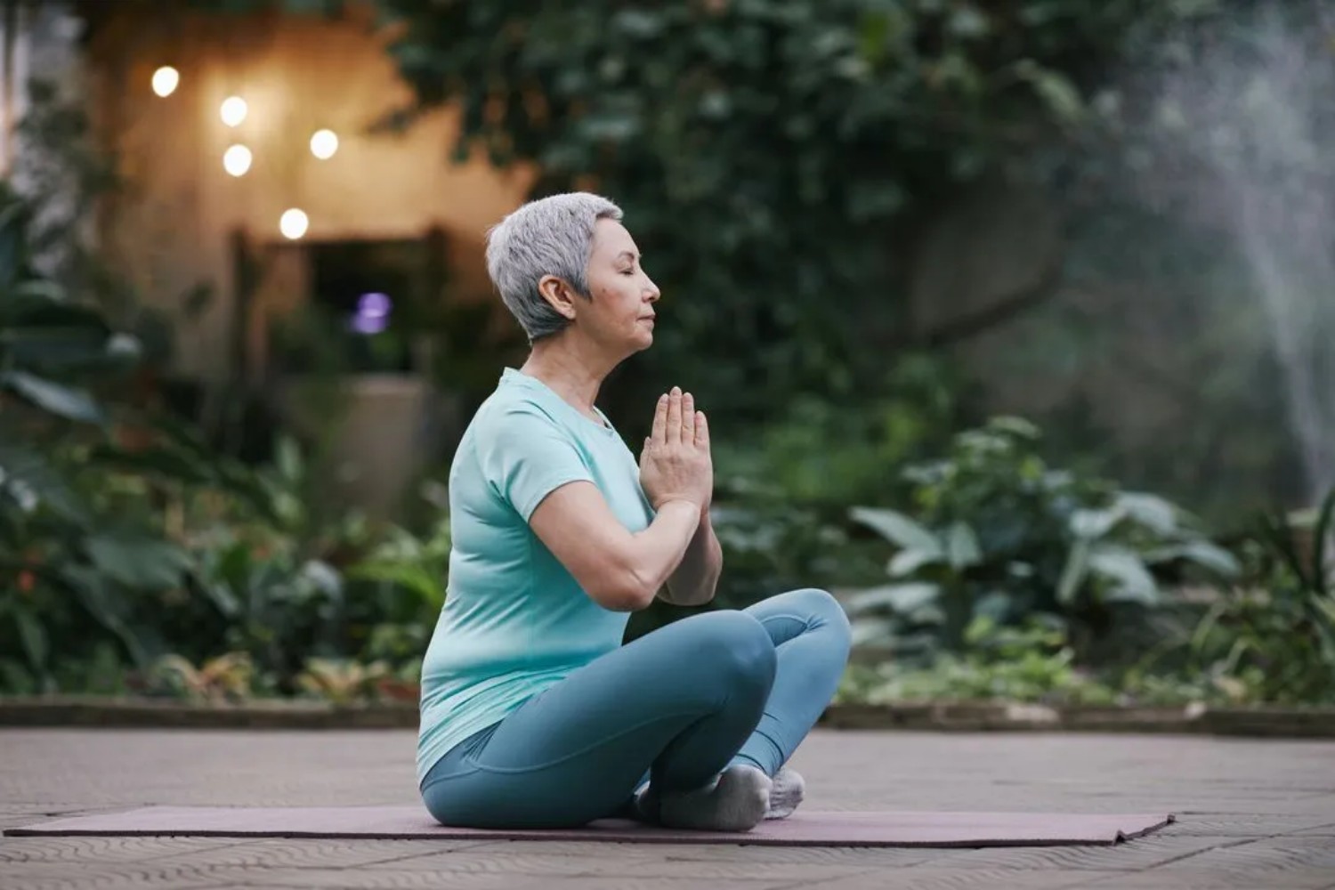 Senior woman practicing yoga