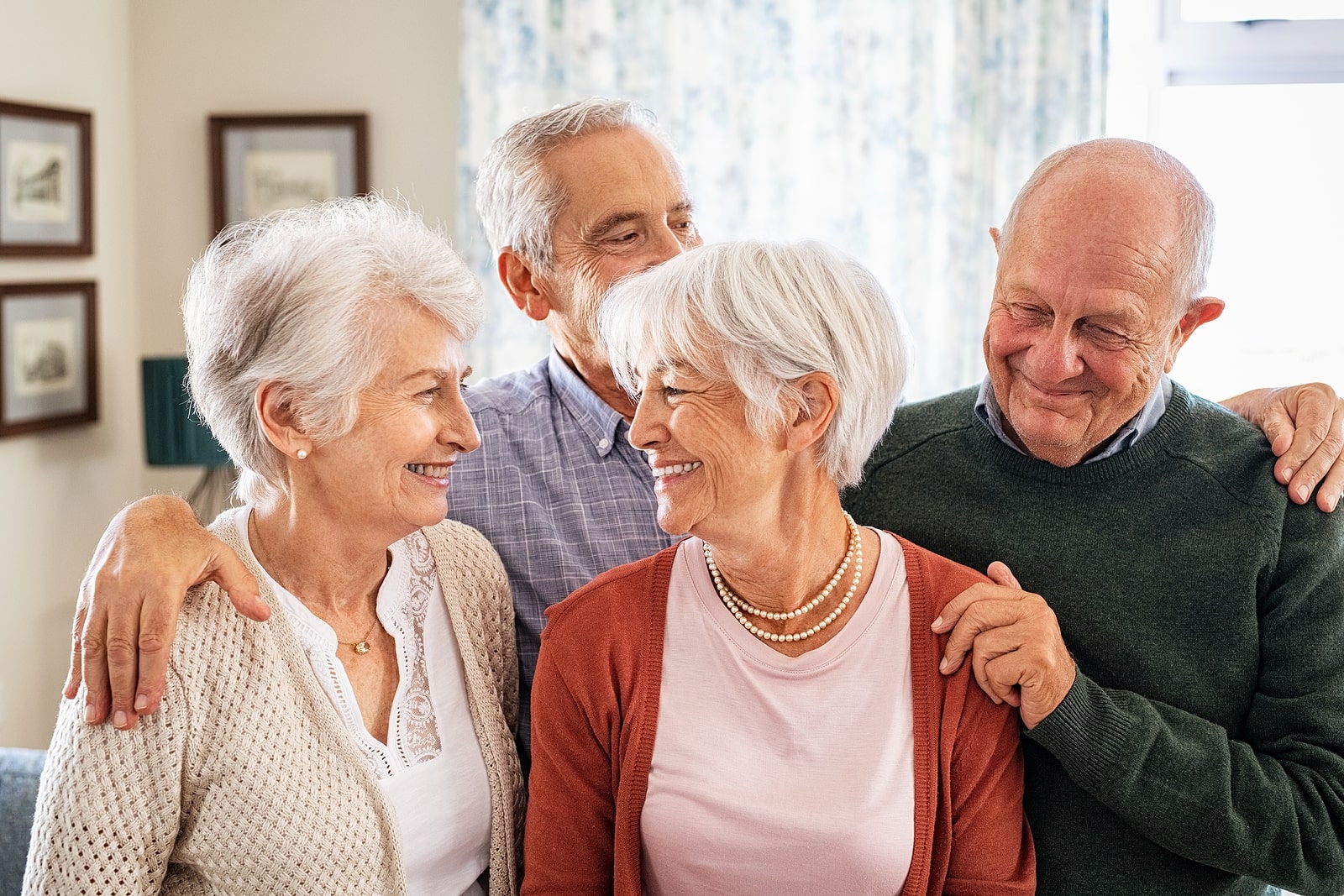 senior friends laughing together