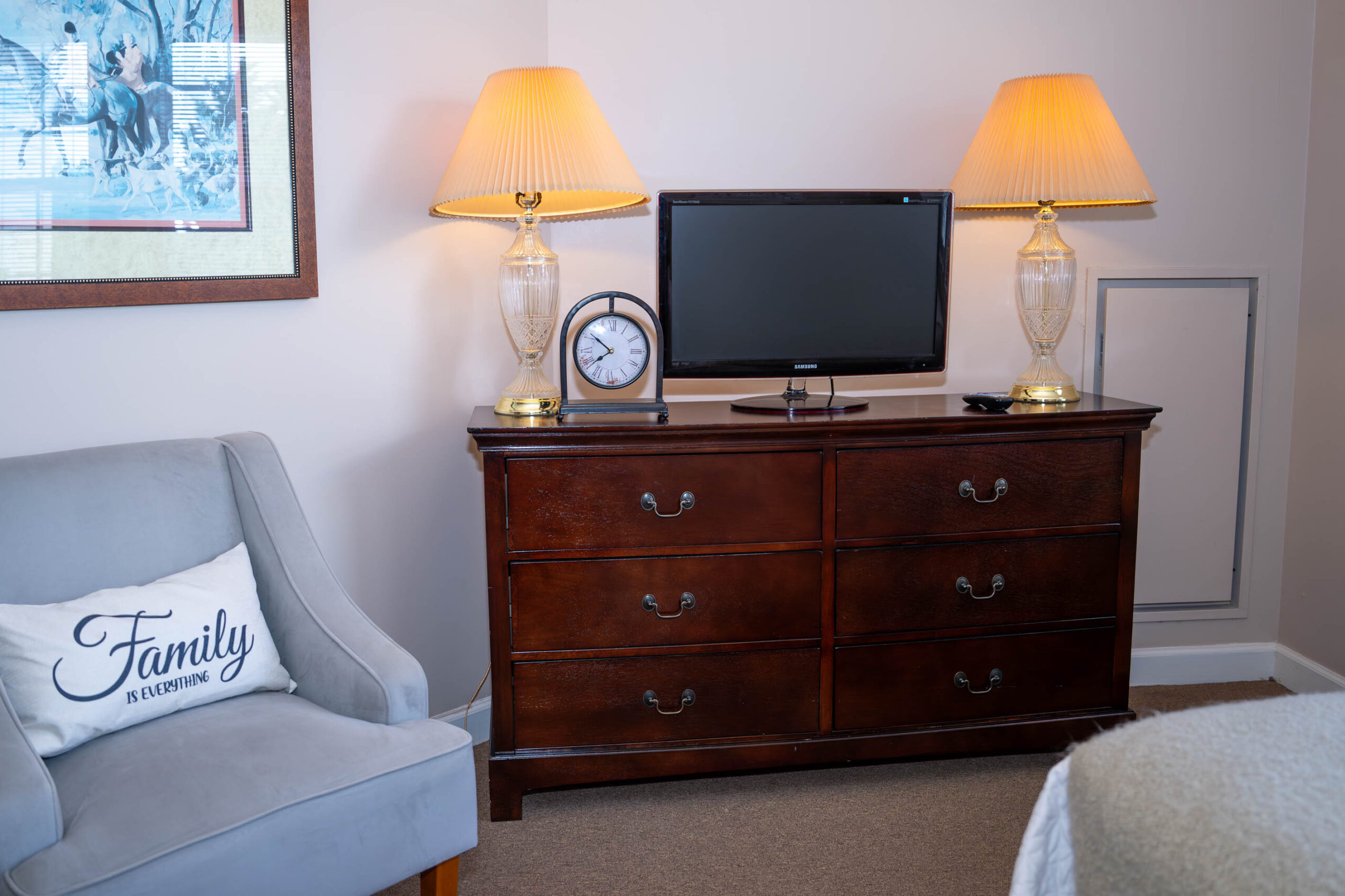 armoire with tv and sitting chair straiht on
