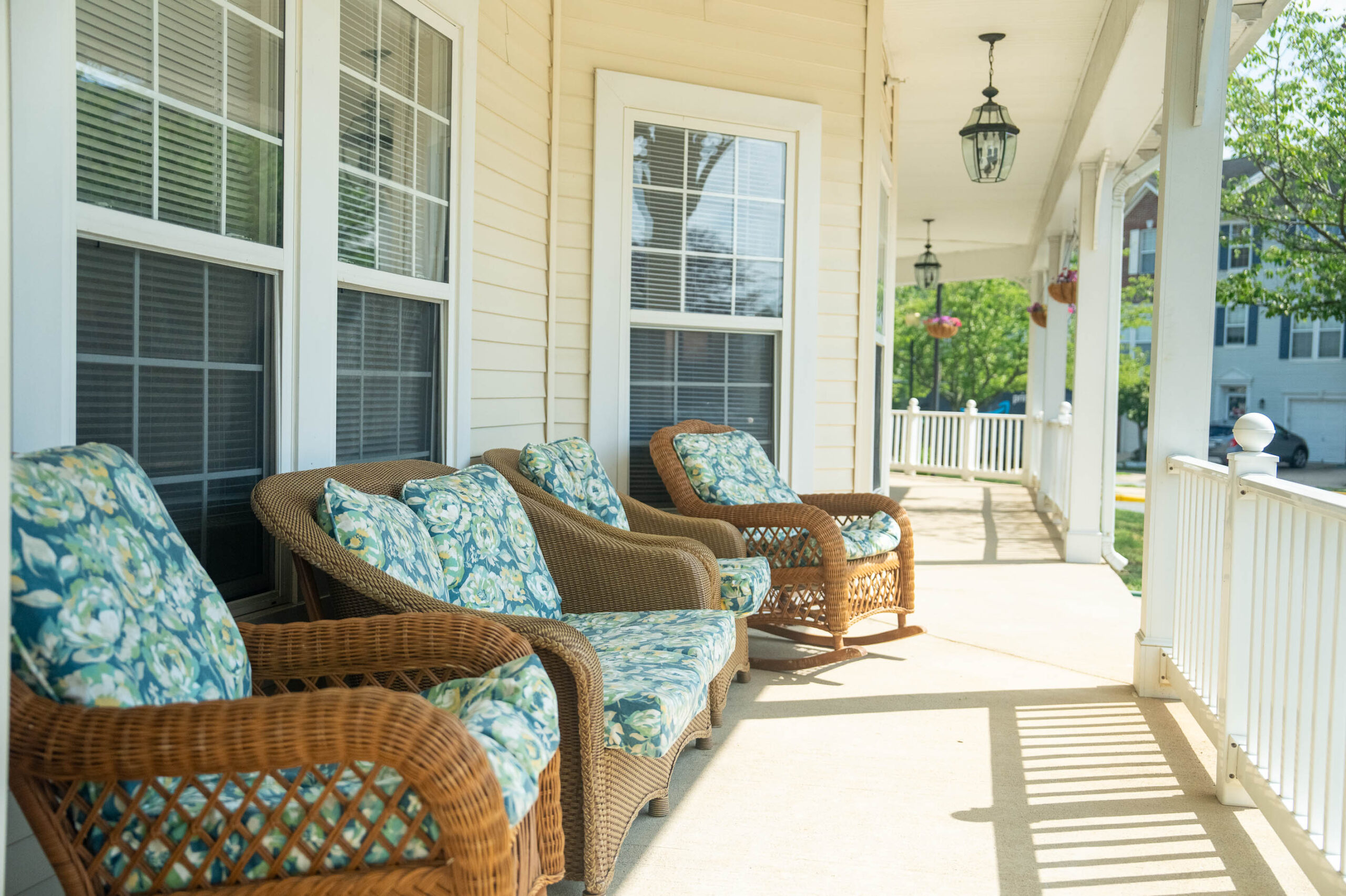 wicker chairs on porch