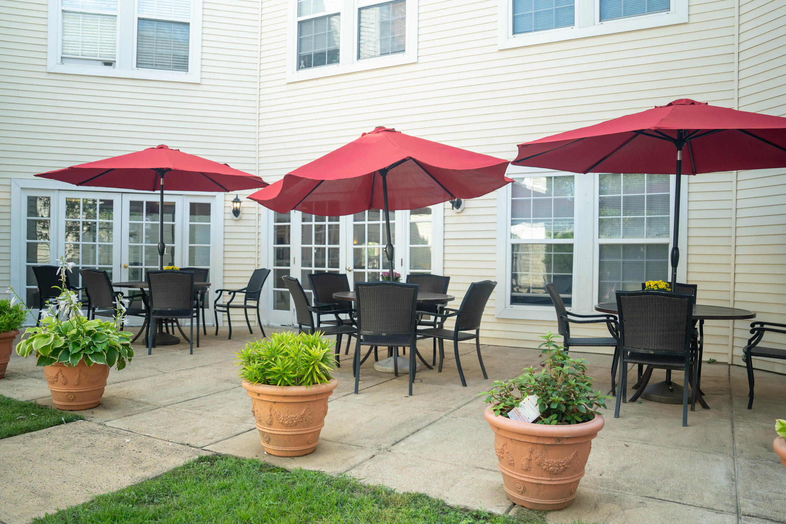 patio with umbrella tables