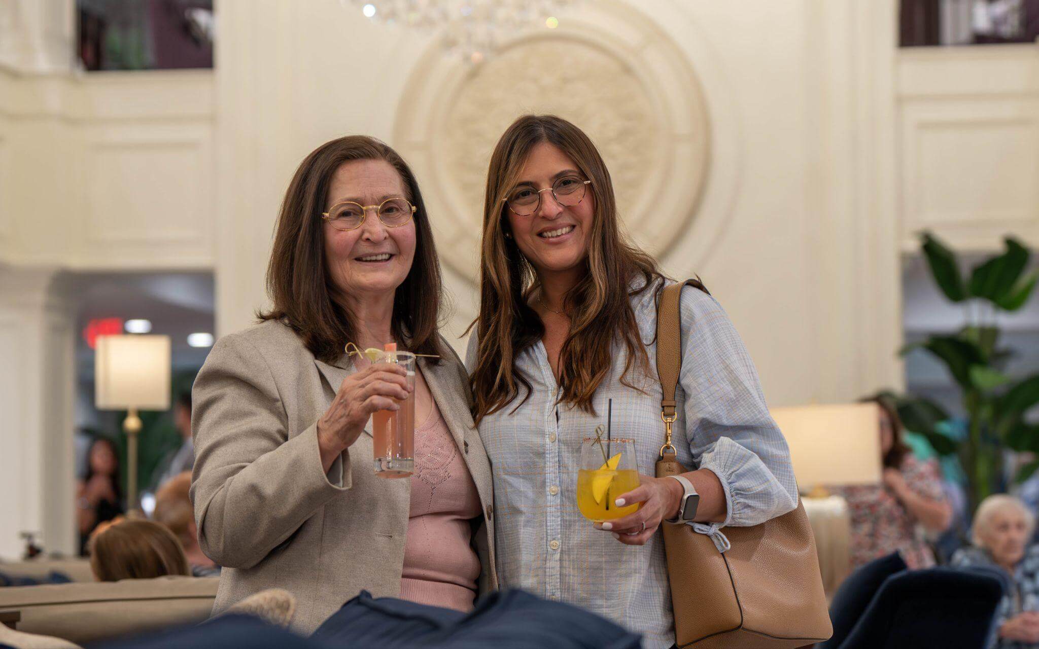 Ladies sharing a drink together