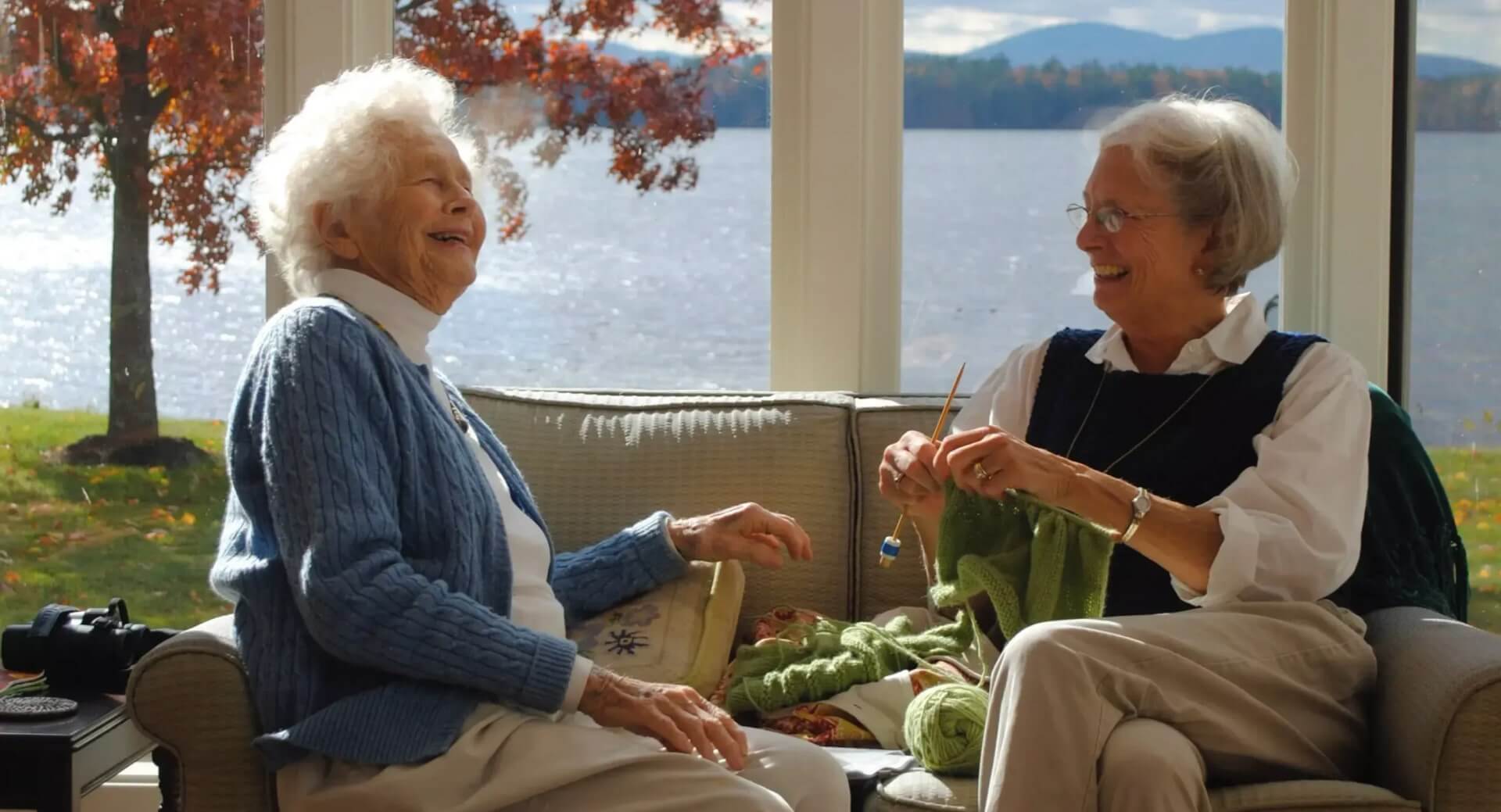 two seniors laughing